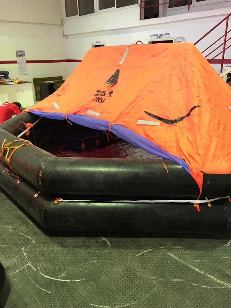 Liferaft canopy and boarding opening under inspection