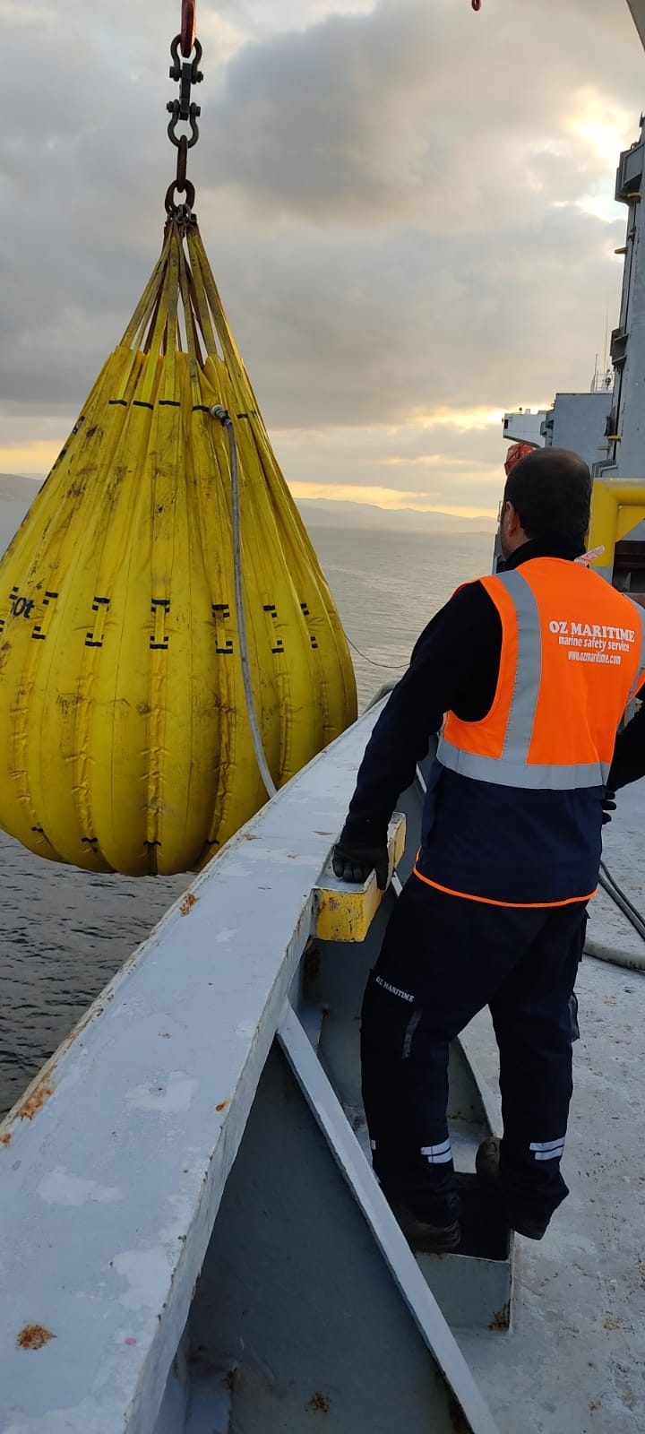 OZ Maritime technician observing the suspended test load