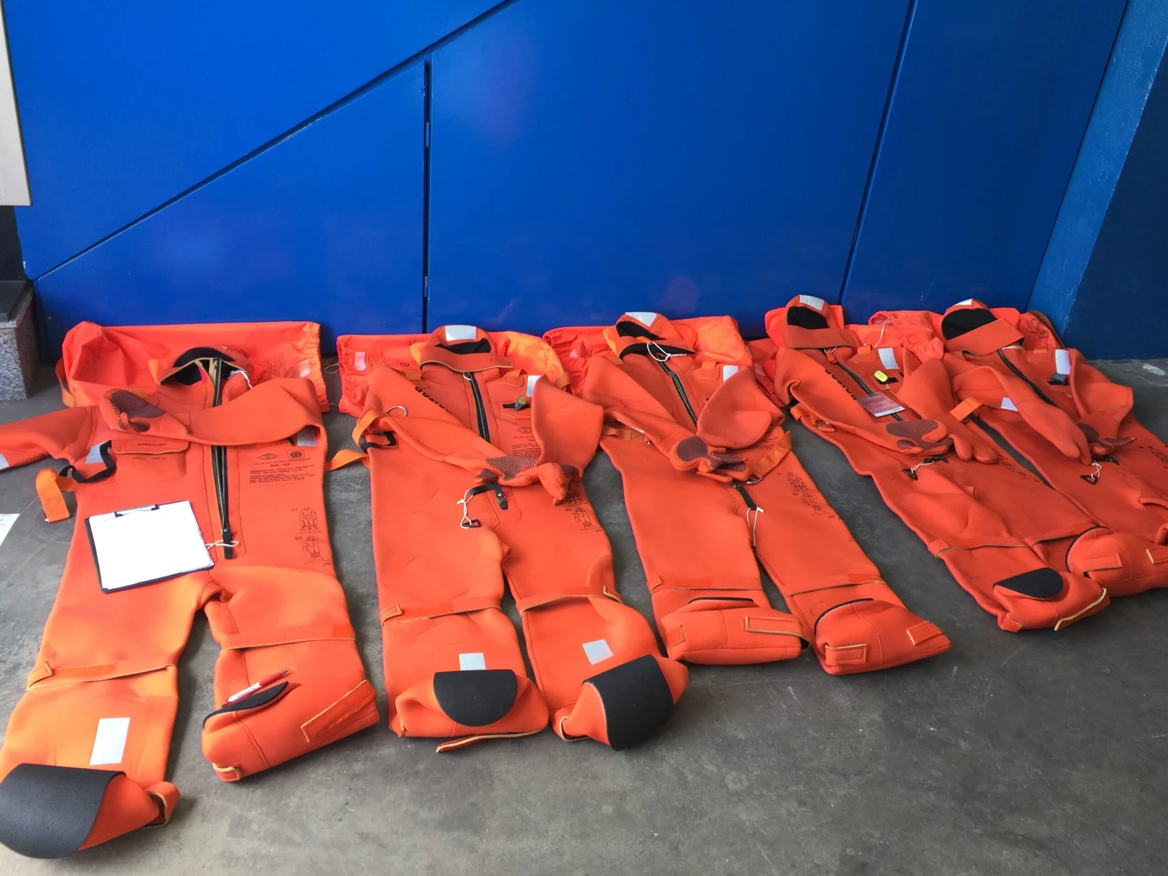Inflatable lifejackets laid out for inspection