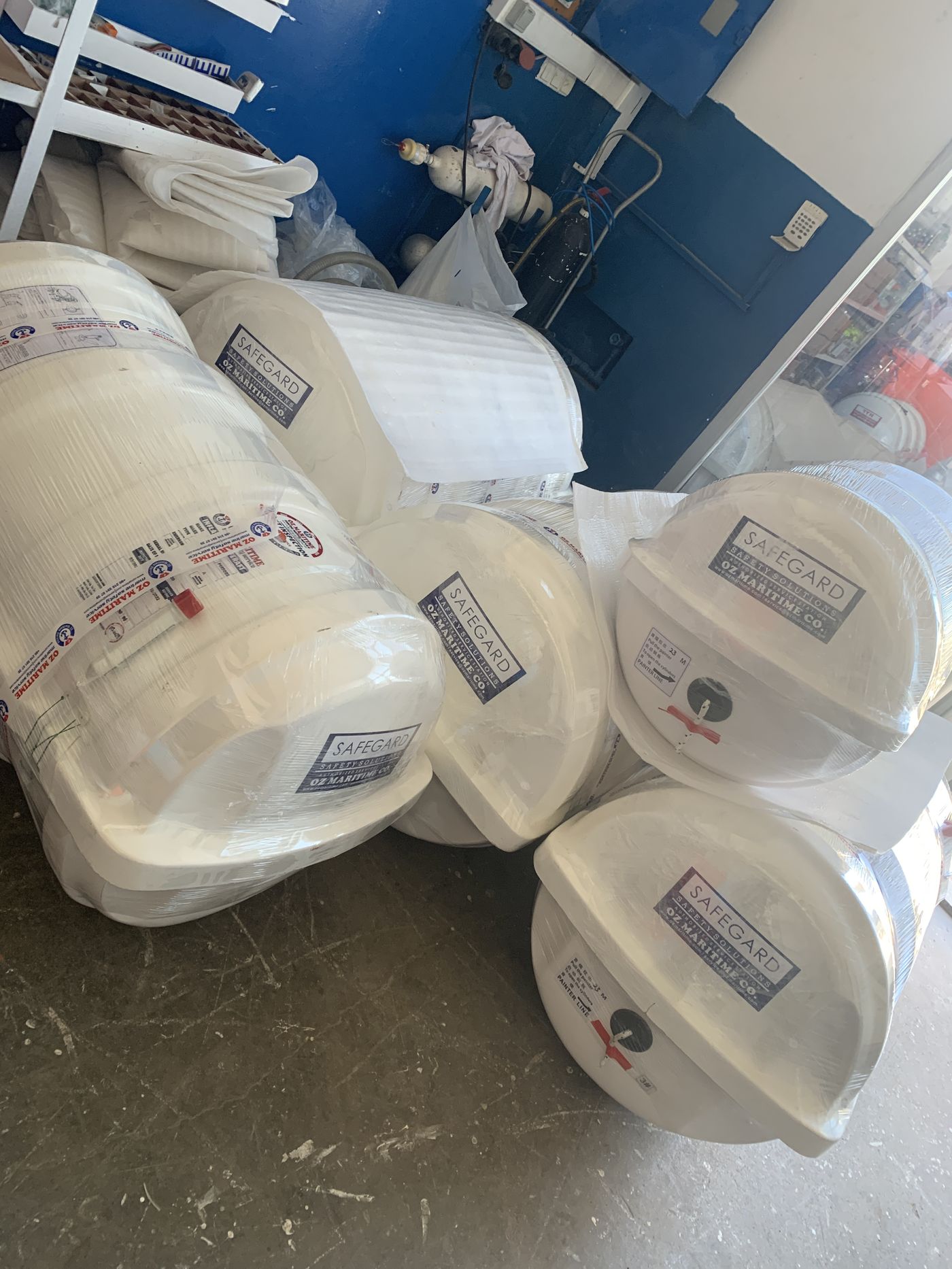Liferaft containers held in the marine equipment stores