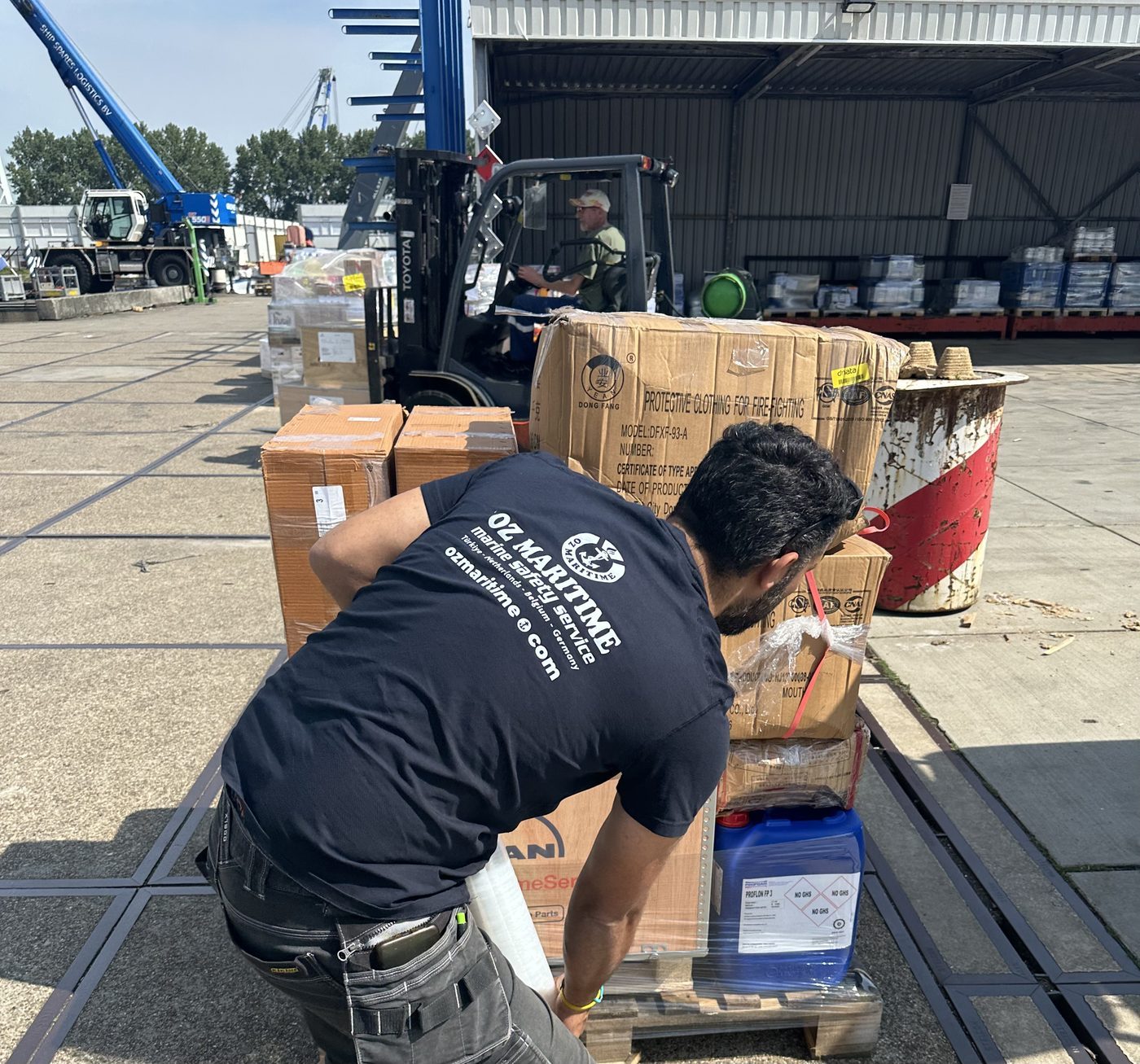 OZ Maritime team preparing marine supplies at the quay
