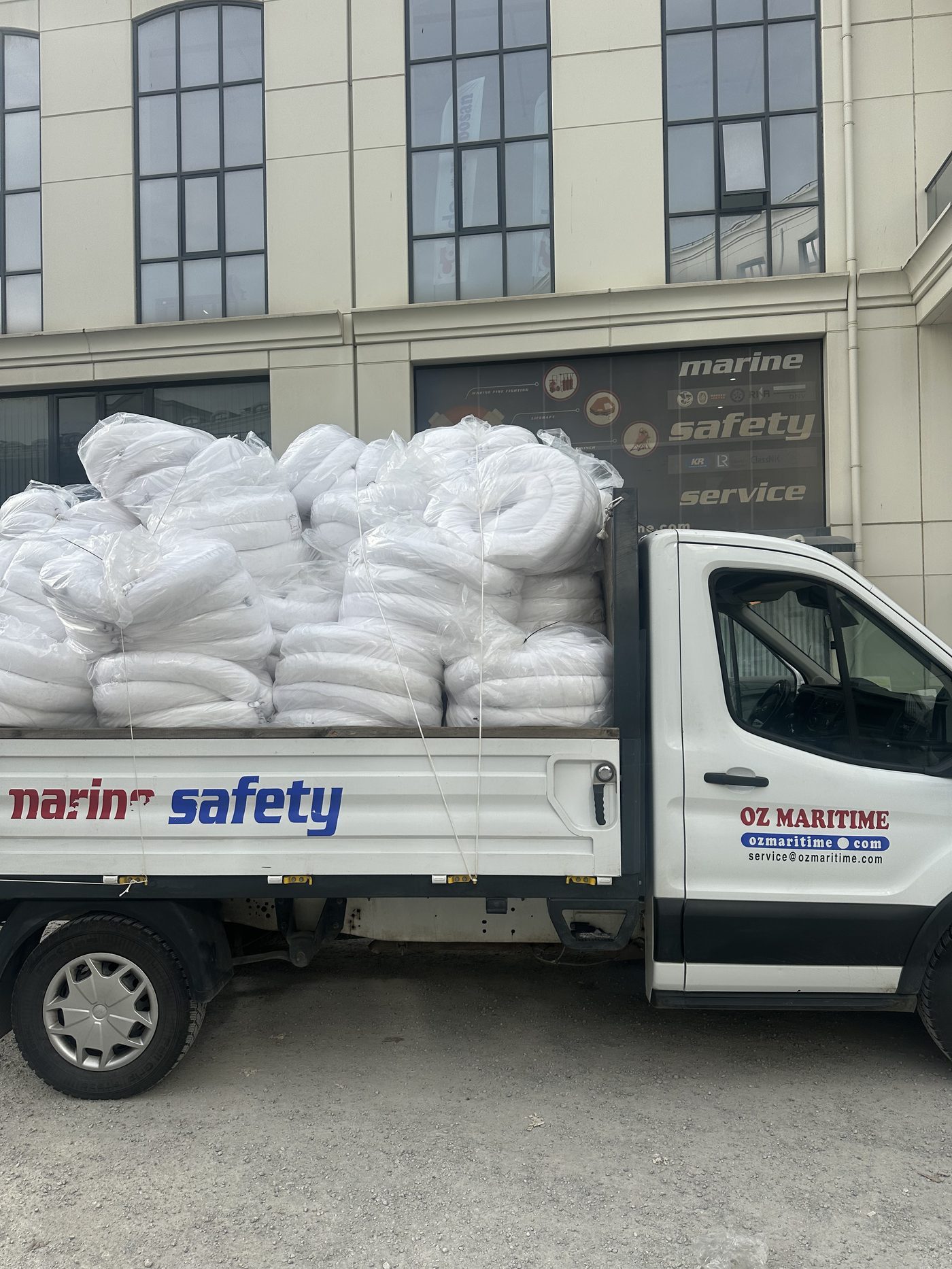OZ Maritime delivery truck loaded outside the company premises